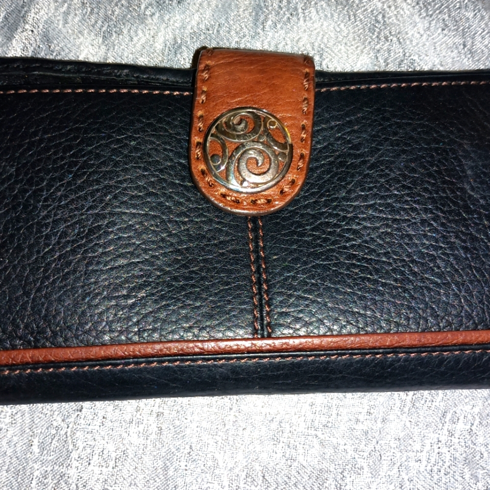 Black & brown leather wallet with silver hardware.